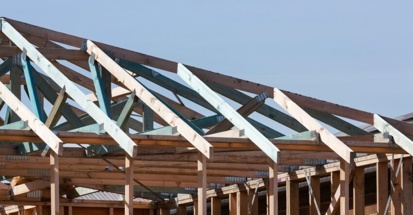 Photo by Troy Mortier the roof of a house being built